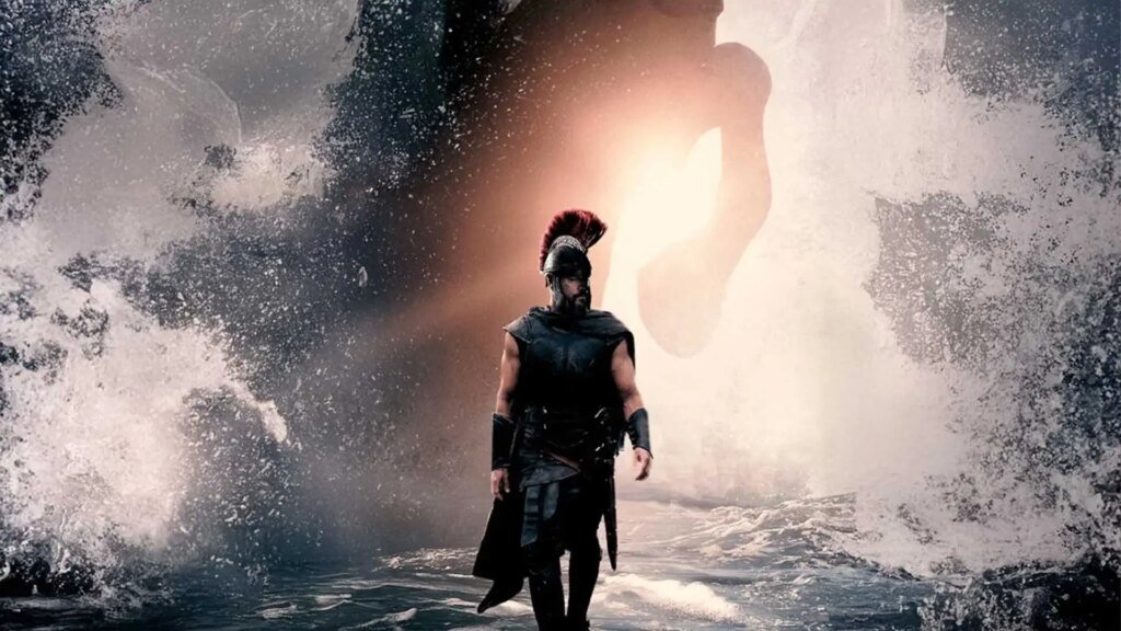 reescreva o título em português do brasil usando outras palavras: New Footage from The Odyssey Reveals Brutal Trojan Horse Sequence, Charlize Theron's Calypso E não acrescentar nenhum texto ou tag além do próprio texto traduzido